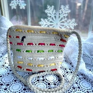 Craft and Barrow macramé crossbody off white with woven colorful summer ribbons